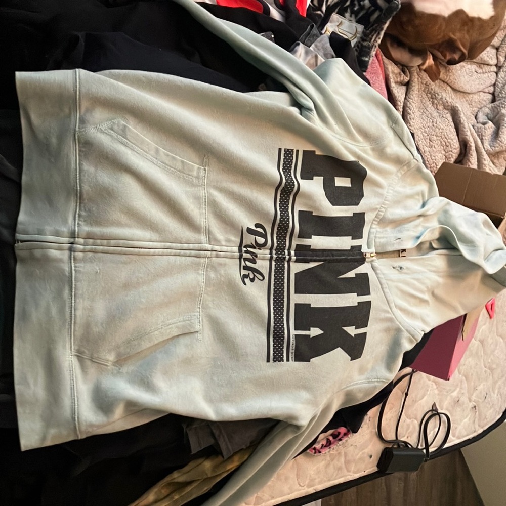 Thin light blue “Pink” brand jacket.